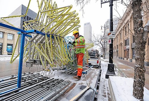 RUTH BONNEVILLE / WINNIPEG FREE PRESS

Standup - Christmas lights up

Kevin Bonds works with crews to install Christmas lights along Portage Ave. as fresh-fallen snow blankets the city on Monday.  


October 30th, 2023