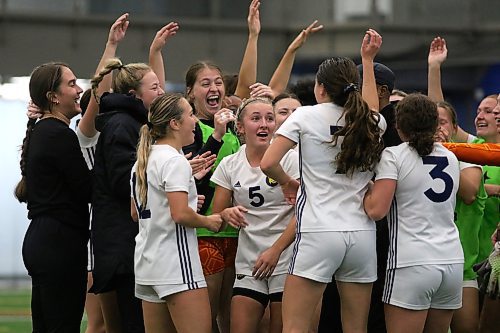 The Brandon University Bobcats celebrate their MCAC women's soccer championship at WSF Soccer North on Tuesday after beating the Providence Pilots on the final. (Thomas Friesen/The Brandon Sun)
