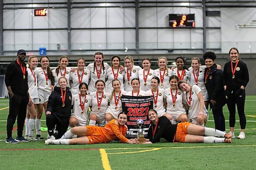 The Brandon University Bobcats celebrate their MCAC women's soccer championship at WSF Soccer North on Tuesday after beating the Providence Pilots on the final. (Thomas Friesen/The Brandon Sun)