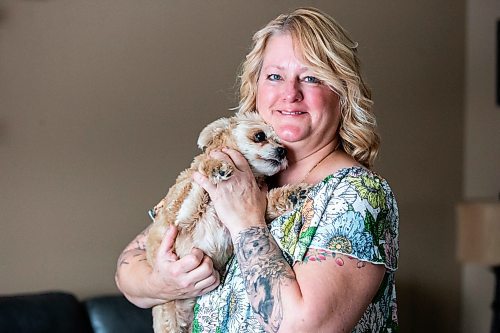 MIKAELA MACKENZIE / WINNIPEG FREE PRESS

Christine Klassen with her dog, Sam, on Tuesday, Oct. 31, 2023. After Klassen&#x573; dog Lucy died last winter, she decided to get a tattoo to memorialize her longtime companion. For Eva story.
Winnipeg Free Press 2023.