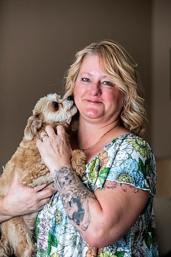 MIKAELA MACKENZIE / WINNIPEG FREE PRESS

Christine Klassen with her dog, Sam, on Tuesday, Oct. 31, 2023. After Klassen&#x573; dog Lucy died last winter, she decided to get a tattoo to memorialize her longtime companion. For Eva story.
Winnipeg Free Press 2023.