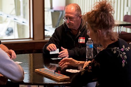 BROOK JONES / WINNIPEG FREE PRESS
Winnipegger Lyndon Demers hosts Lyndon's Cribbage Nights every second Wednesday from 6:30 to 9 p.m. on the second floor of Heather Curling Club at 120 Youville Street. As many as 20 enthusiatic cribbage players gather for the cribbage nights, rotating opponents as the evening goes along. Pictured: Winnipeg resident Ron Kuzie playing cribbage with Winnipegger Bonnie Cruse (right) at the Heather Curling Club in Winnipeg, Man., Wednesday, Oct. 25, 2023.
