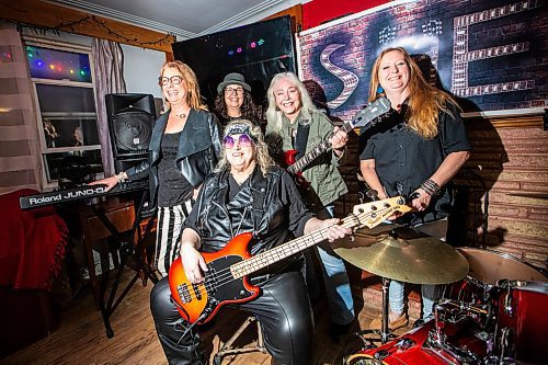 MIKAELA MACKENZIE / WINNIPEG FREE PRESS

Allyson Krawec (left), Shannon David, Treasure Peterson, Tracy Young-Dodds, and Barb Smith (who make up the all-female rock band, She) on Wednesday, Nov. 1, 2023. For Dave Sanderson story.
Winnipeg Free Press 2023.