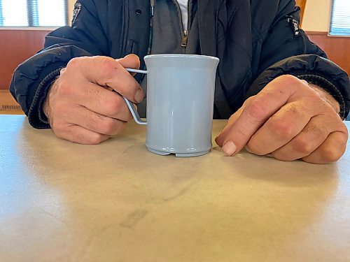 MALAK ABAS / WINNIPEG FREE PRESS

Jeff, 61, finishes off a cup of coffee at Our Daily Bread soup kitchen in Selkirk. Despite a debilitating disability, he tries to work odd jobs to supplement his income assistance payments.
