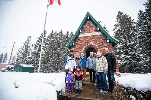 MIKAELA MACKENZIE / WINNIPEG FREE PRESS

Jennifer Ching-Faux (top left), Myra Amy-McElroy, Wilf Klippenstein, Harvey Kinsman, Brian McElroy, Shannon Holenski, Glen Holenski, Sienna Faux (two, bottom left), and Kip Faux (four, bottom right) pose for a photo in front of the war memorial in Darlingford, Manitoba on Monday, Oct. 30, 2023. For Jen story.
Winnipeg Free Press 2023.