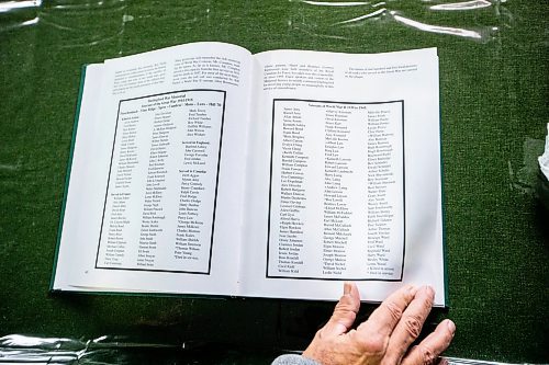 MIKAELA MACKENZIE / WINNIPEG FREE PRESS
Brian McElroy flips through the Darlingford Saga in Darlingford, Manitoba on Monday, Oct. 30, 2023. For Jen story.
Winnipeg Free Press 2023.