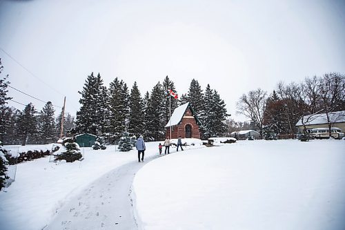 MIKAELA MACKENZIE / WINNIPEG FREE PRESS

Harvey Kinsman (left), Kip Faux (four), Shannon Holenski, and Brian McElroy walk towards the war memorial in Darlingford, Manitoba on Monday, Oct. 30, 2023. For Jen story.
Winnipeg Free Press 2023.