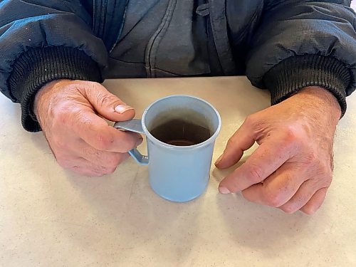 MALAK ABAS / WINNIPEG FREE PRESS

Jeff, 61, finishes off a cup of coffee at Our Daily Bread soup kitchen in Selkirk. Despite a debilitating disability, he tries to work odd jobs to supplement his income assistance payments.
