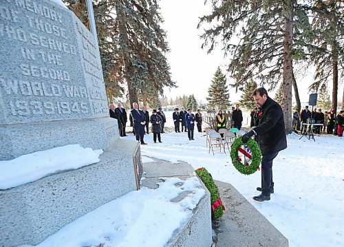 Representing the Government of Manitoba, newly elected Brandon East NDP MLA Glen Simard places a wreath at the cenotaph during the No Stone Left Alone ceremony at the Brandon Municipal Cemetery on Friday morning. (Matt Goerzen/The Brandon Sun)