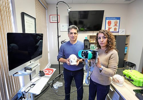 RUTH BONNEVILLE / WINNIPEG FREE PRESS
 
BIZ - Neuroptek

Photo of Dr. Neda Anssari (woman)  and Dr. Behzad Mansouri, CEO and COO, respectively (married couple), of Neuroptek with their invention called EyeMirage which counts eye movements to aid the diagnosis of a concussion.  

Their first prototype was made out of cardboard and eventually developed into a simple yet sophisticated diagnosis devise that is a game changer for their industry.  


What: Neuroptek is a start-up that won the People&#x573; Choice award at a neuro-tech pitch event Thursday night. They won $5,000, which will go to creating a device that can detect concussions pretty much immediately. It looks kind of like a VR headset; you put it over your eyes.

Gabby's story
                    
Nov 3rd,, 2023