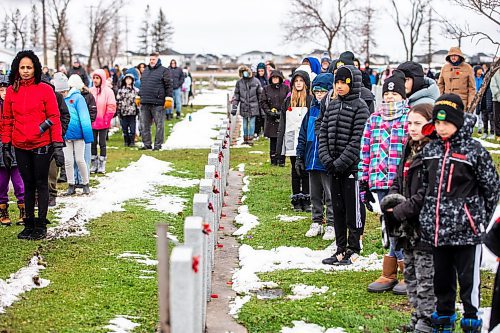 MIKAELA MACKENZIE / WINNIPEG FREE PRESS

Grade six students from River East Transcona School Division attend a No Stone Left Alone remembrance ceremony at Transcona Cemetery on Monday, Nov. 6, 2023. 
Winnipeg Free Press 2023.