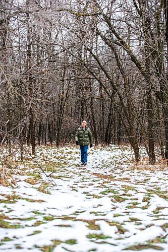 MIKAELA MACKENZIE / WINNIPEG FREE PRESS

Gerald Tole in the forest near Lemay Avenue on Monday, Nov. 6, 2023. He is concerned, as the 22 acres of forest near his home is slated to be developed.
Winnipeg Free Press 2023.