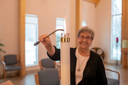 BROOK JONES / WINNIPEG FREE PRESS
After 60 years located on 74 acres in the RM of West St. Paul, St. Benedict's Monastery has moved to its new location at 419 Youville St., in St. Boniface. Pictured: Sister Mary Coswin lights a candle inside the chapel at St. Benedict's Monastery in Winnipeg, Man., Tuesday, Nov. 7, 2023.