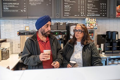 BROOK JONES / WINNIPEG FREE PRESS
The Coffee Culture Caf&#xe9; and Eatery at 2864 Pembina Highway in Winnipeg, Man., was broken into Sunday, Nov. 5, 2023. PIctured: Co-owners Paramjeet Mehendiratta (left) and his wife Sandeep Mehendiratta hold coffee cups while standing inside their caf&#xe9; and eatery in Winnipeg, Man., Wednesday, Nov. 8, 2023.
