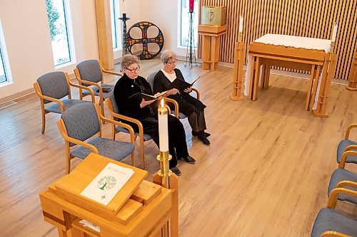 BROOK JONES / WINNIPEG FREE PRESS
After 60 years located on 74 acres in the RM of West St. Paul, St. Benedict's Monastery has moved to its new location at 419 Youville St., in St. Boniface. Pictured: Sister Dorothy Levandosky (left), who is the canonical administrator of St. Benedict's Monastery and Sister Mary Coswin, read The Divine Offering while sitting inside the chapel at the monastery in Winnipeg, Man., Tuesday, Nov. 7, 2023.