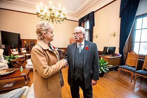 MIKAELA MACKENZIE / WINNIPEG FREE PRESS

Former speaker Myrna Driedger and new house speaker Tom Lindsey shake hands in the speaker&#x573; office at the Manitoba Legislative Building on Thursday, Nov. 9, 2023. For Carol story.
Winnipeg Free Press 2023.