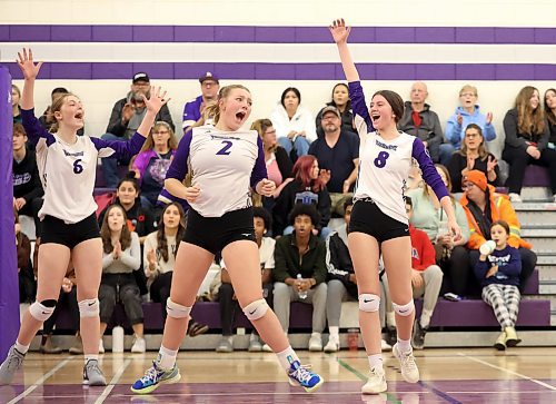 Zoe Price (6), Kypling Black (2) and Macy Snyder (8) of the Vincent Massey Vikings celebrate a point during match two of the varsity girls city championship against the Neelin Spartans at VMHS on Thursday evening. The Vikings won the first match of the series prior to Thursday’s match. (Tim Smith/The Brandon Sun)