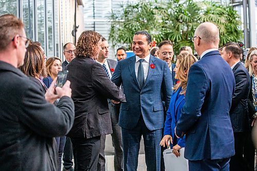 MIKAELA MACKENZIE / WINNIPEG FREE PRESS

Canada&#x573; deputy prime minister and minister of finance Chrystia Freeland and premier Wab Kinew greet Brandon and Winnipeg mayors after making an announcement at Manitoba Hydro on Thursday, Nov. 9, 2023. For Danielle story.
Winnipeg Free Press 2023.