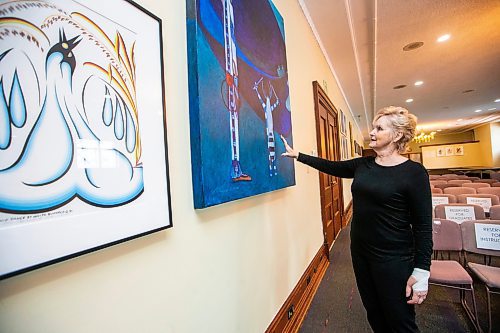 MIKAELA MACKENZIE / WINNIPEG FREE PRESS

Former speaker Myrna Driedger looks at Untitled-07.93 by Linus Woods (one of the pieces that stood out for her) in the collection of Indigenous art that she gathered from various offices throughout the building to display in the Golden Boy room at the Manitoba Legislative Building on Thursday, Nov. 9, 2023. For Carol story.
Winnipeg Free Press 2023.