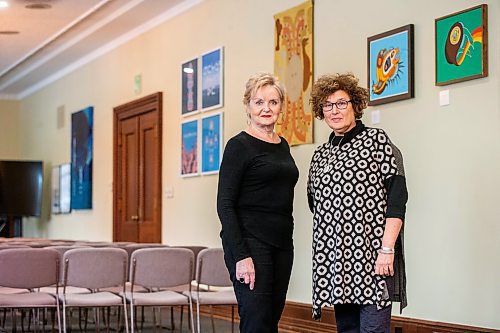 MIKAELA MACKENZIE / WINNIPEG FREE PRESS

Former speaker Myrna Driedger (left) and visual arts consultant for sport, culture, heritage, and tourism Amy Karlinsky with the collection of Indigenous art that they gathered from various offices throughout the building to display in the Golden Boy room at the Manitoba Legislative Building on Thursday, Nov. 9, 2023. For Carol story.
Winnipeg Free Press 2023.