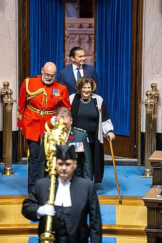 MIKAELA MACKENZIE / WINNIPEG FREE PRESS

Lieutenant Governor Anita Neville and premier Wab Kinew enter the legislative chamber at the acclimation for new house speaker Tom Lindsey on Thursday, Nov. 9, 2023. For Carol story.
Winnipeg Free Press 2023.