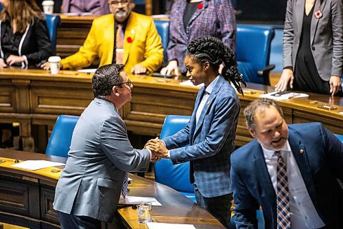 MIKAELA MACKENZIE / WINNIPEG FREE PRESS

PC MLA Jeff Wharton shakes hands with health minister Uzoma Asagwara at the acclimation for new house speaker Tom Lindsey in the legislative chamber on Thursday, Nov. 9, 2023. For Carol story.
Winnipeg Free Press 2023.