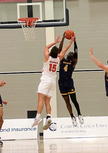 Eli Ampofo hauls downa. rebound and draws a foul to help send the game into overtime. (Thomas Friesen/The Brandon Sun)