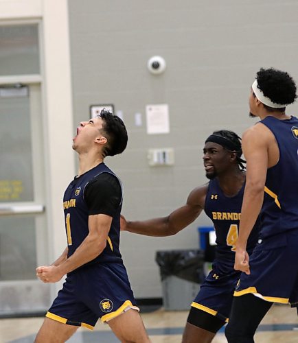 Travis Hamberger, left, hit the game-winning shot as the Brandon University Bobcats beat the TRU WolfPack 85-84 in overtime at the Healthy Living Centre on Saturday. (Thomas Friesen/The Brandon Sun)