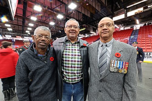 Brothers Peter Gero, from left, Walter Gero and John Gero are the grand nephews to Joseph and William Paris, two brothers who were part of the original No. 2 Construction Battalion, a predominantly Black battalion that was formed in 1916 during the First World War in Nova Scotia. Since learning of their grand uncles' heritage earlier this year, John, Walter and Peter laid a wreath at the cenotaph during Brandon's Remembrance Day ceremony at the Keystone Centre on Saturday. (Photos by Matt Goerzen/The Brandon Sun)
