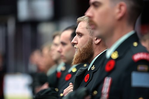 Soldiers with the Second Battalion Princess Patricia's Canadian Light Infantry doft their caps for a prayer during Brandon's Remembrance Day ceremony at the Keystone Centre on Saturday morning. (Matt Goerzen/The Brandon Sun)