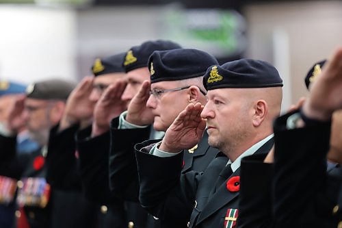 From right: Maj. Scott Youngson and Master Warrant Officer Ken Hood, both with CFB Shilo, stand beside Lt. Col. Joe O'Donnel, CO of the First Regiment Canadian Horse Artillery, and Chief Warrant Officer Sean McGowan, the Regimental Sargeant Major of 1RCHA, during Brandon's Remembrance Day ceremony at the Keystone Centre on Saturday morning. (Matt Goerzen/The Brandon Sun).