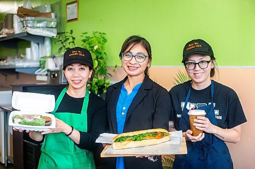 MIKAELA MACKENZIE / WINNIPEG FREE PRESS

Owner Kim Le (centre) with employees Jenny Tran (left) and Ngoc Le at Winnipeg&#x573; Khnh Ha, which made the cut for &#x482;est sandwich in the world&#x4e0;on a Guardian List, on Monday, Nov. 13, 2023. For Erik story.
Winnipeg Free Press 2023.