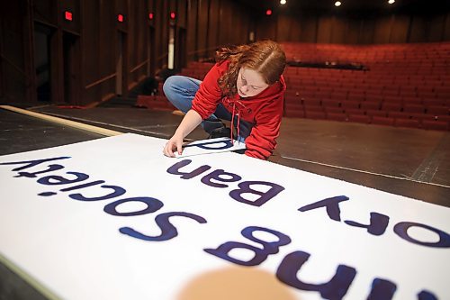 13112023
Catherine Hicks helps build the set and props along with other École Secondaire Neelin High School students on Monday in preparation for their upcoming presentation of the musical "Where’s Charley?" at the Western Manitoba Centennial Auditorium. Performances run from Wednesday until Friday. 
(Tim Smith/The Brandon Sun) 