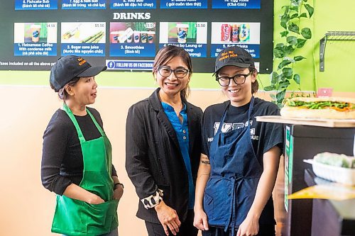 MIKAELA MACKENZIE / WINNIPEG FREE PRESS

Owner Kim Le (centre) with employees Jenny Tran (left) and Ngoc Le at Winnipeg's Khanh Hoa, which made the cut for best sandwich in the world on a Guardian List, on Monday, Nov. 13, 2023. For Erik story.
Winnipeg Free Press 2023.