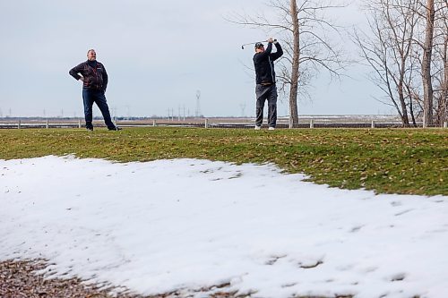 MIKE DEAL / WINNIPEG FREE PRESS
Golfers Dragan Velaja (left) and Kevin Milne (right) took the opportunity to hit the links at Southside Golf Course which opened its course because of the warm weather. 
See Kevin Rollason story
231113 - Monday, November 13, 2023.