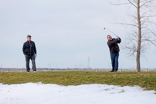 MIKE DEAL / WINNIPEG FREE PRESS
Golfers Dragan Velaja (right) and Kevin Milne (left) took the opportunity to hit the links at Southside Golf Course which opened its course because of the warm weather. 
See Kevin Rollason story
231113 - Monday, November 13, 2023.