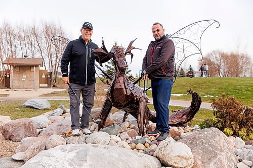 MIKE DEAL / WINNIPEG FREE PRESS
Golfers Dragan Velaja (right) and Kevin Milne (left) pose by a dragon sculpture at Southside Golf Course which opened its course because of the warm weather. 
See Kevin Rollason story
231113 - Monday, November 13, 2023.