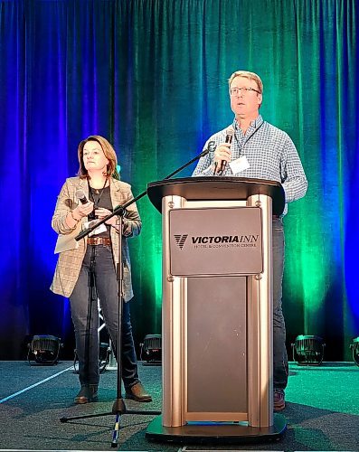 Tanis (right) and Derek (left) Axten, owners of Axten Farms Ltd. in Minton, Sask., spoke at the conference on shifting practices in farming that will help to shape a healthier world for tomorrow. (Miranda Leybourne/The Brandon Sun)