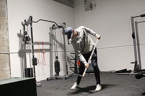 Austin Dobrescu is certified through Titleist Performance Institute to train golfers' strength and mobility in the gym at Evo. (Thomas Friesen/The Brandon Sun)
