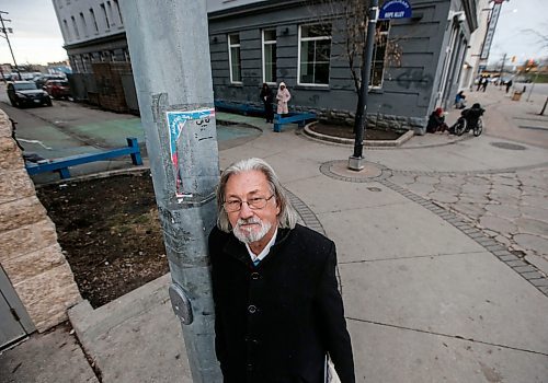 JOHN WOODS / WINNIPEG FREE PRESS
Al Wiebe, a Peer and Community Engagement Trainer with lived experience, is photographed at Henry Avenue and Main St. in Winnipeg Tuesday, November 14, 2023. Wiebe hopes that the city will approve his plan to convert the block into a space for the local community and rename it Hope Alley.

Reporter: rollason