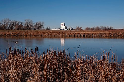 15112023
The former Co-Op Feeds elevator is reflected in the Assiniboine River on a sunny Wednesday morning.  (Tim Smith/The Brandon Sun)