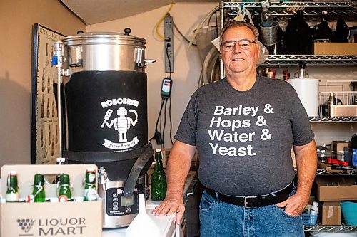 MIKAELA MACKENZIE / WINNIPEG FREE PRESS

Chuck MacKenzie, home brewer who recently won a competition for a Winnipeg-inspired beer, with his brewing setup on Wednesday, Nov. 15, 2023. His winning Jeanne's cake-flavoured pastry stout will be released at Devil May Care Independent Brewers starting this Friday for a tasting party. For Katie story.
Winnipeg Free Press 2023.