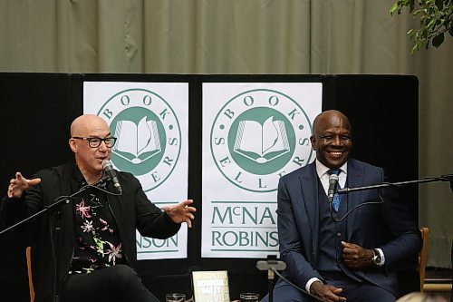 BROOK JONES / WINNIPEG FREE PRESS
103.1 Virgin Raido personality Ace Burpee (left) setting the stage for one his questions for Canadian sprinting legend Donovan Bailey (right) at Bailey's book launch at McNally Robinson in Winnipeg, Man., Wednesday, Nov. 15, 2023. An Evening with Donovan Bailey was hosted Burpee. Bailey, who is an Olympian in the sport of athletics (track &amp; field) and won double gold at the 1996 Summer Olympic Games in Atlanta, Ga., was in Winnipeg promoting his book Undisputed.