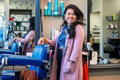 MIKAELA MACKENZIE / WINNIPEG FREE PRESS

Golda Ferrer poses for a photo at her work (a hair salon) on Wednesday, Nov. 15, 2023. A change in her memory was one of the first signs of perimenopause for Ferrer. For AV story.
Winnipeg Free Press 2023.