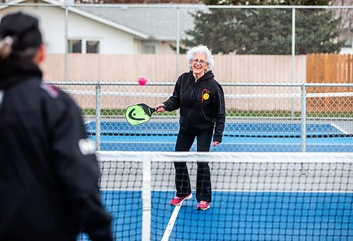 MIKAELA MACKENZIE / WINNIPEG FREE PRESS

Cecile LeBlanc (centre) plays pickleball with her friend Muyrna Kereluk at Jill Officer Park in North Kildonan on Monday, Nov. 20, 2023.  LeBlanc plays five days a week indoors in the winter, but is also savouring the unexpected extended outdoor season with the current warmer weather. She says that there need to be more easily accessible public pickleball courts (both indoor and outdoor), as the sport is a key way that many seniors stay active these days. Standup.
Winnipeg Free Press 2023.