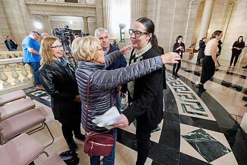 MIKE DEAL / WINNIPEG FREE PRESS
Laura Lapointe, individual with lived experience, is hugged by her family after speaking during the opening announcement of Substance Use and Addictions Awareness Week, at the Manitoba Legislative building Monday morning. Manitoba Substance Use and Addictions Awareness Week (M-SUAAW) provides an opportunity for Manitobans from all walks of life to engage in meaningful discussions and explore solutions for addressing the harms caused by substance use and addictions.
231120 - Monday, November 20, 2023.