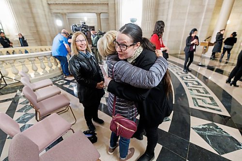 MIKE DEAL / WINNIPEG FREE PRESS
Laura Lapointe, individual with lived experience, is hugged by her family after speaking during the opening announcement of Substance Use and Addictions Awareness Week, at the Manitoba Legislative building Monday morning. Manitoba Substance Use and Addictions Awareness Week (M-SUAAW) provides an opportunity for Manitobans from all walks of life to engage in meaningful discussions and explore solutions for addressing the harms caused by substance use and addictions.
231120 - Monday, November 20, 2023.