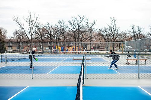 MIKAELA MACKENZIE / WINNIPEG FREE PRESS

Cecile LeBlanc (left) and Muyrna Kereluk play pickleball at Jill Officer Park in North Kildonan on Monday, Nov. 20, 2023.  LeBlanc plays five days a week indoors in the winter, but is also savouring the unexpected extended outdoor season with the current warmer weather. She says that there need to be more easily accessible public pickleball courts (both indoor and outdoor), as the sport is a key way that many seniors stay active these days. Standup.
Winnipeg Free Press 2023.