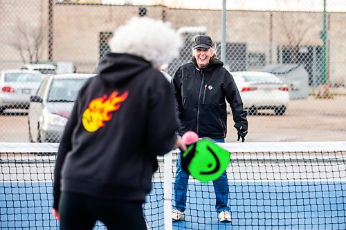 MIKAELA MACKENZIE / WINNIPEG FREE PRESS

Muyrna Kereluk (centre) plays pickleball with her friend Cecile LeBlanc at Jill Officer Park in North Kildonan on Monday, Nov. 20, 2023.  LeBlanc plays five days a week indoors in the winter, but is also savouring the unexpected extended outdoor season with the current warmer weather. She says that there need to be more easily accessible public pickleball courts (both indoor and outdoor), as the sport is a key way that many seniors stay active these days. Standup.
Winnipeg Free Press 2023.