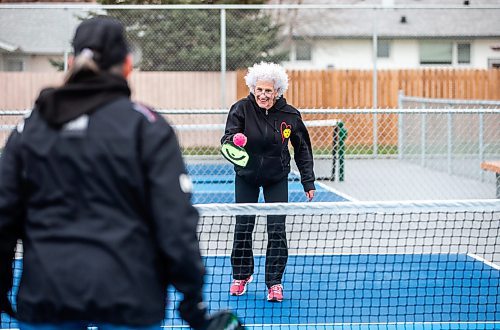 MIKAELA MACKENZIE / WINNIPEG FREE PRESS

Cecile LeBlanc (centre) plays pickleball with her friend Muyrna Kereluk at Jill Officer Park in North Kildonan on Monday, Nov. 20, 2023.  LeBlanc plays five days a week indoors in the winter, but is also savouring the unexpected extended outdoor season with the current warmer weather. She says that there need to be more easily accessible public pickleball courts (both indoor and outdoor), as the sport is a key way that many seniors stay active these days. Standup.
Winnipeg Free Press 2023.